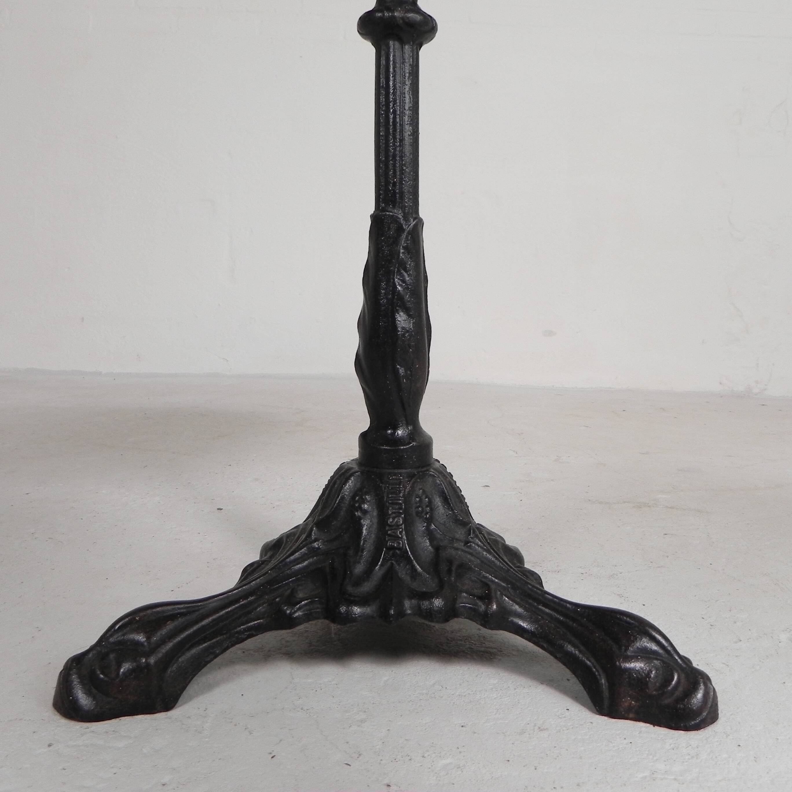 Bistro table with a cast iron base and a traffic sign as a tabletop, Paris 1920s.