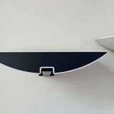 Pair of modernist wall lights, black and white lacquered metal, Italy 1980