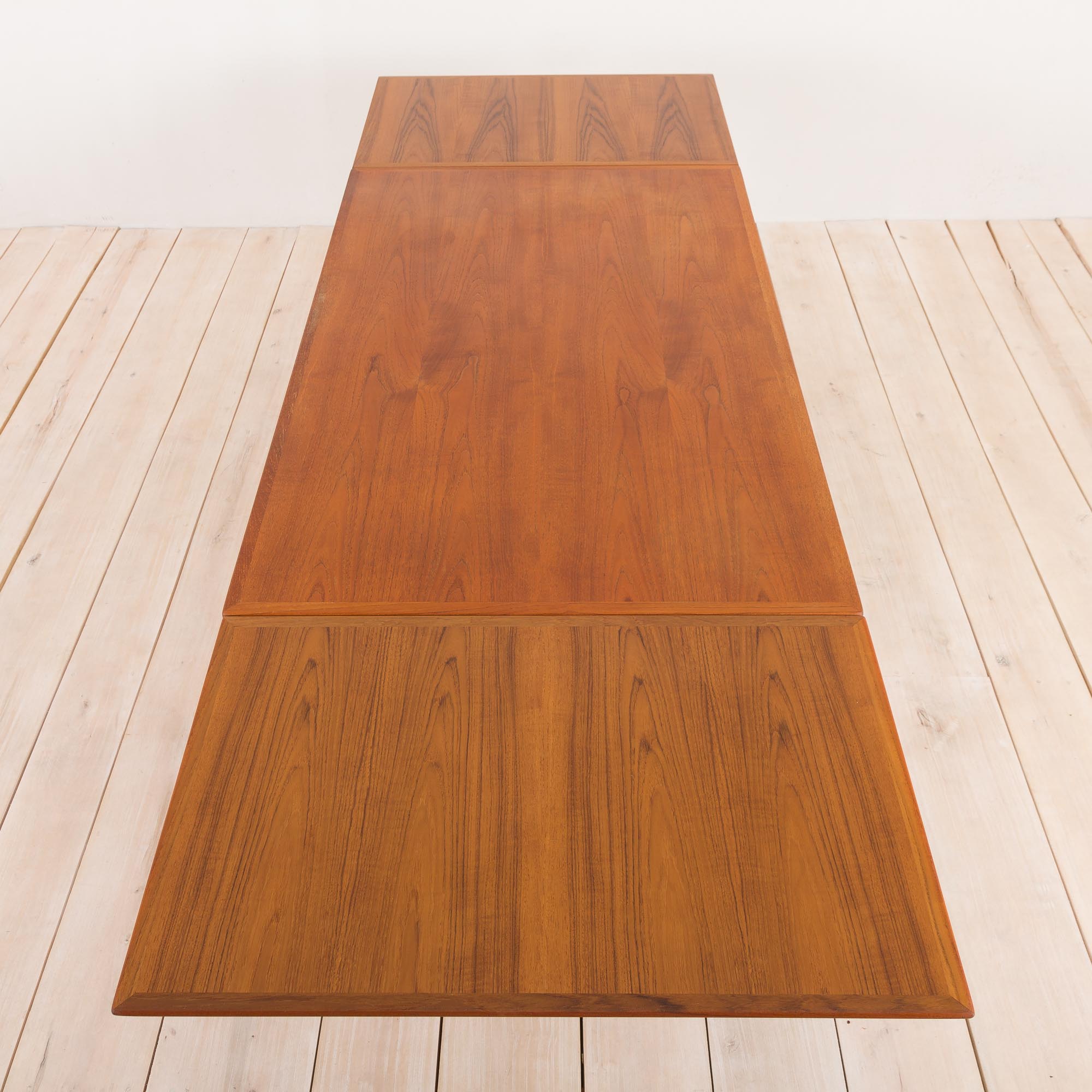 Teak extension dining table with concealed panels, Denmark, 60s