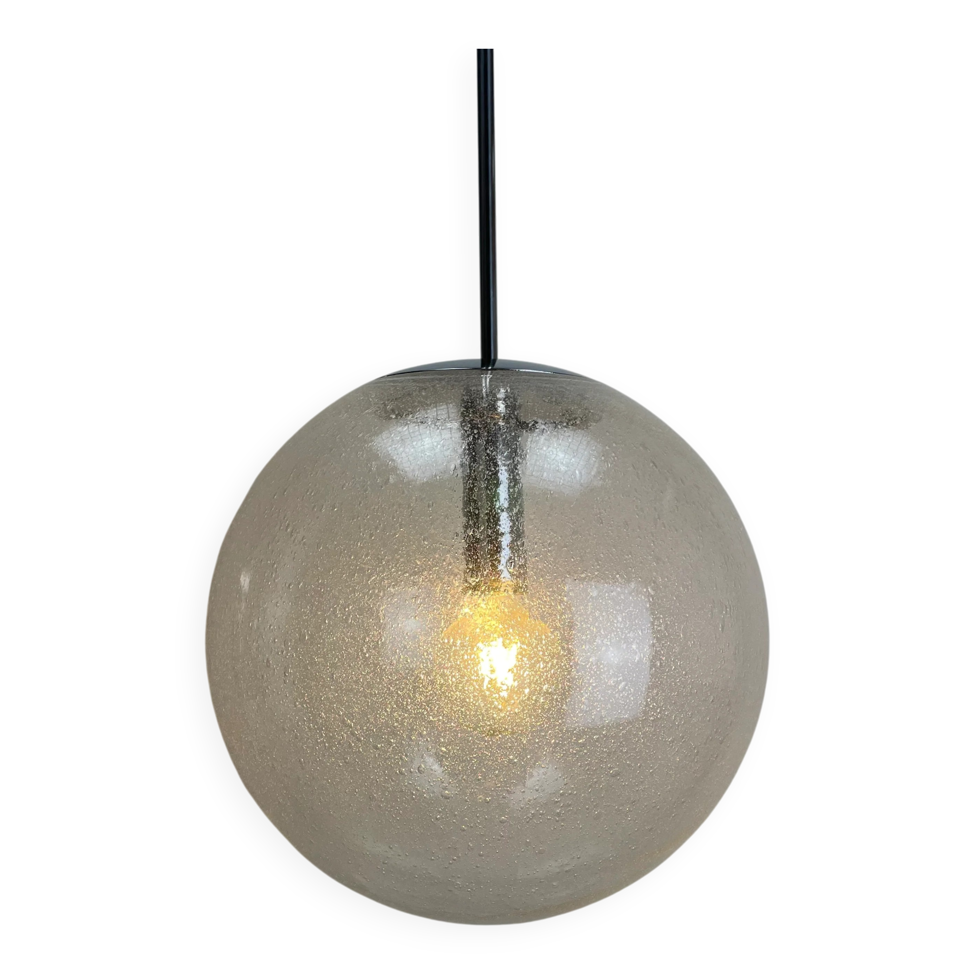 Large suspended lamp with a glass globe featuring bubbles by Peill & Putzler 1970.