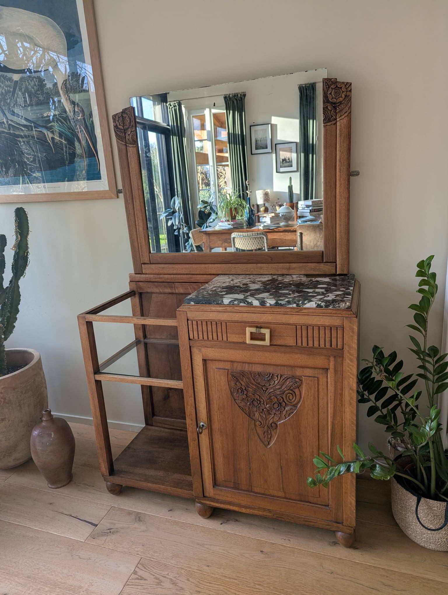 Art Deco wooden furniture with a swivelling mirror and marble top.