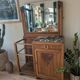 Art Deco wooden furniture with a swivelling mirror and marble top.