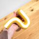 Yellow ceramic twist candle holder