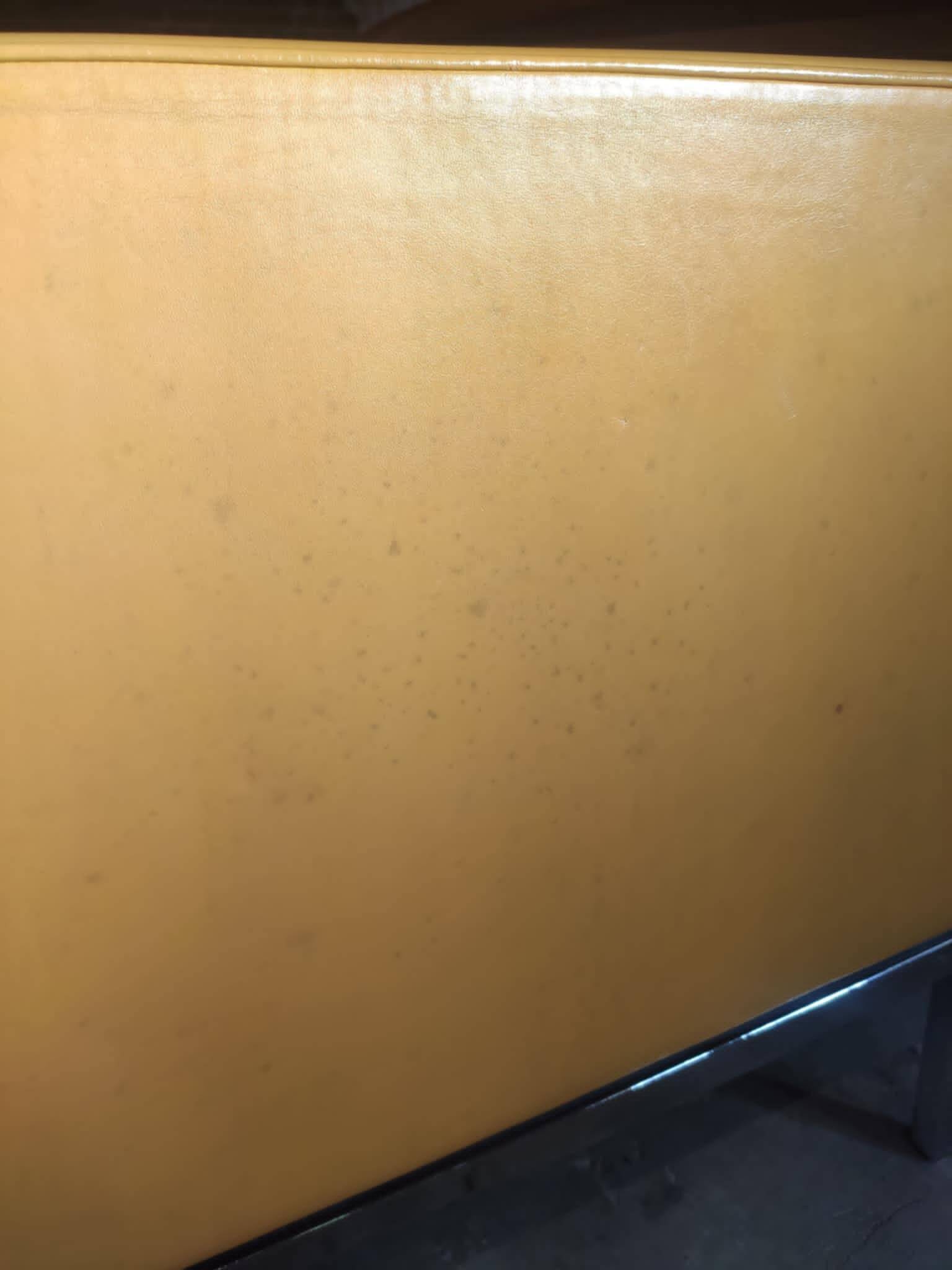 Florence Knoll two-seater sofa in mustard yellow leather, 1970