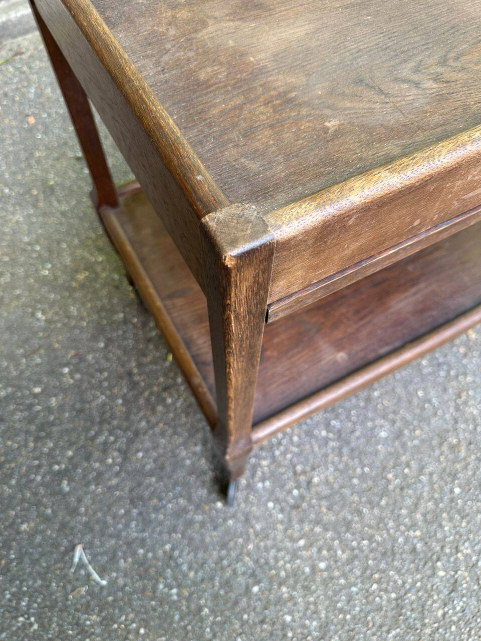 Extendable wooden bar trolley with a glass top from the 1930s.