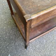 Extendable wooden bar trolley with a glass top from the 1930s.