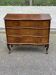 Vintage Chinese wooden commode with decoration.
