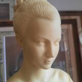 Bust woman on pedestal