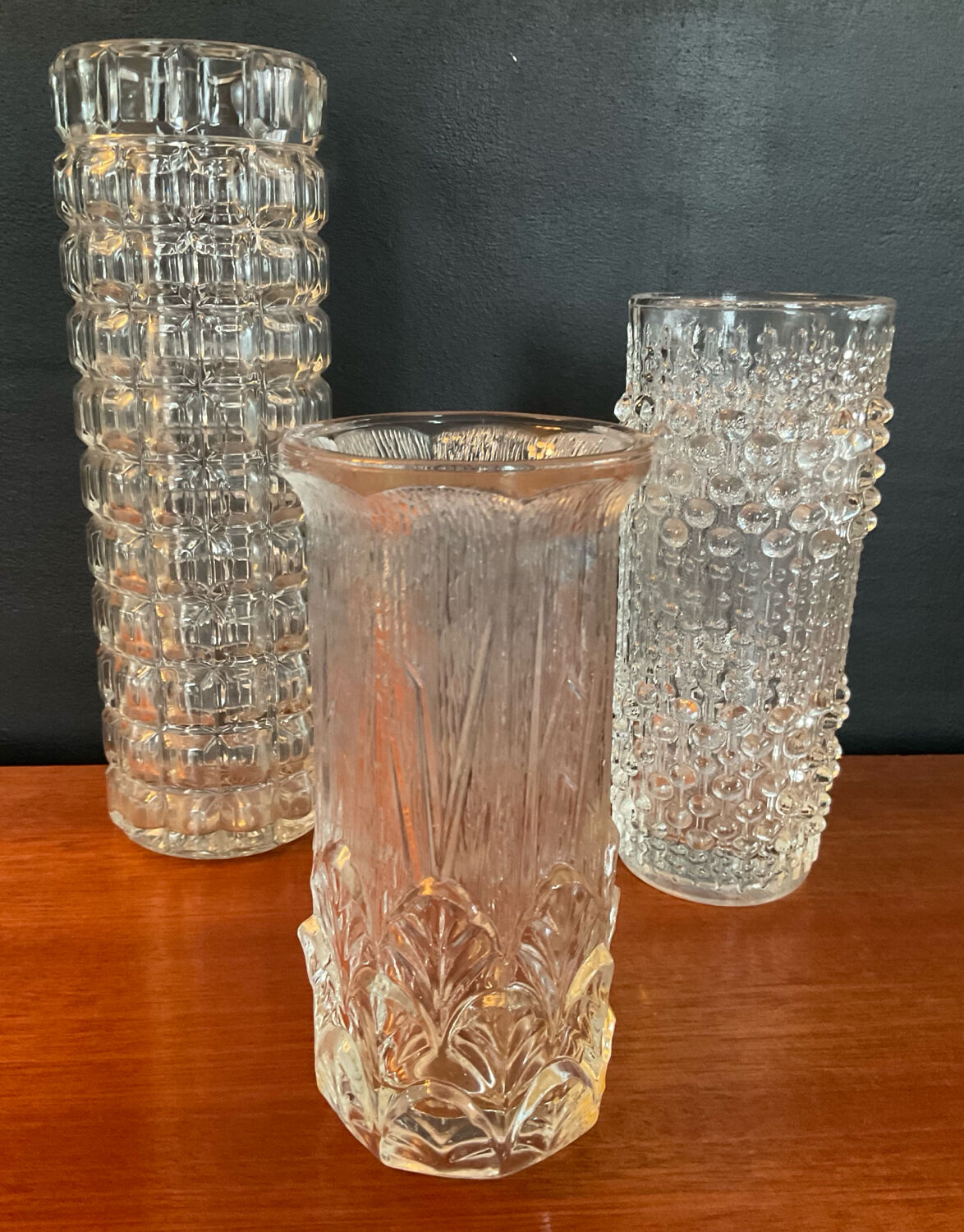 Vintage trio of moulded glass roll vases