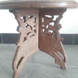 Carved wooden hunting stool decorated with vines
