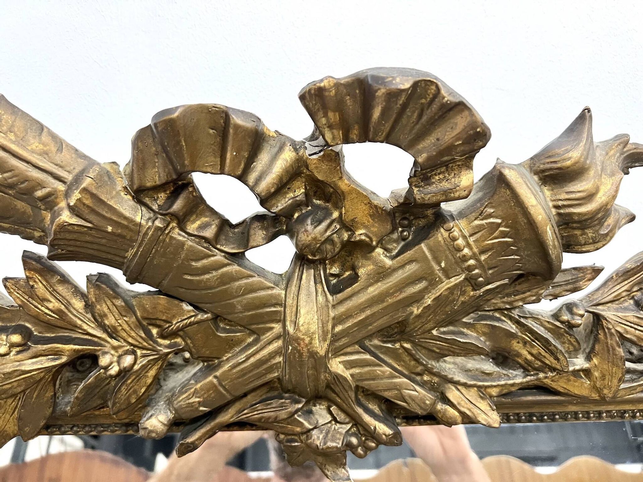 Large antique pediment mirror with mouldings.