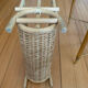 Vintage magazine rack in woven rattan and bamboo.