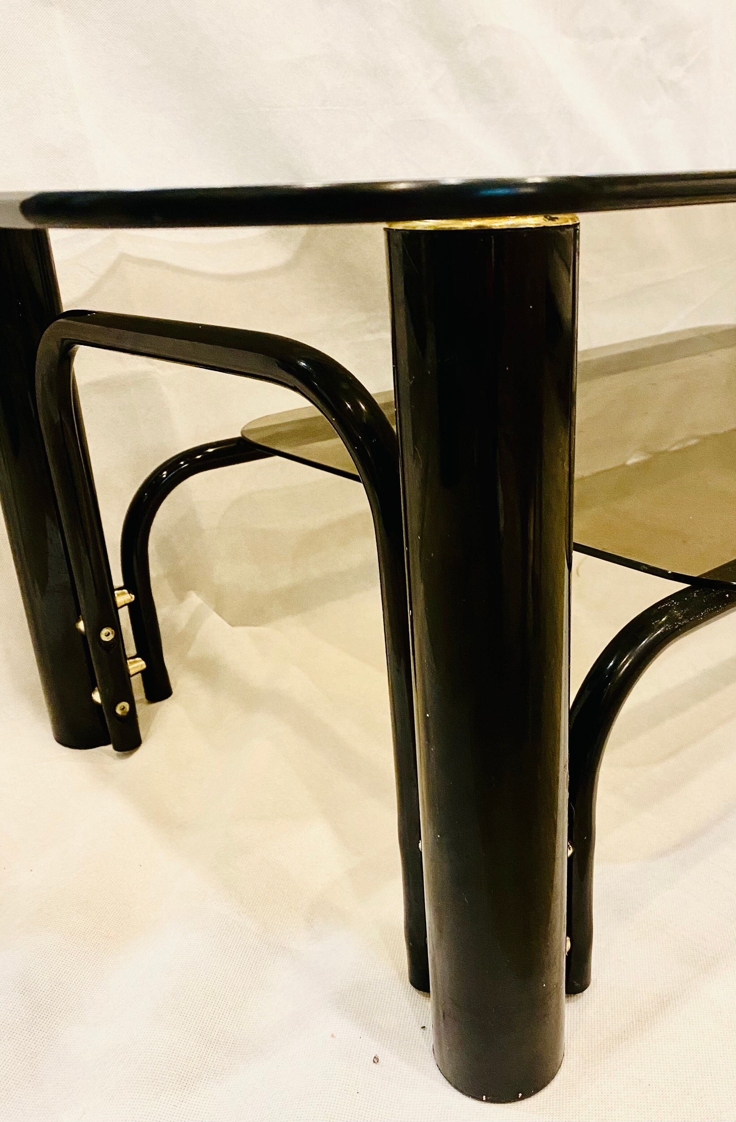 Black and gold coffee table with double tops in smoked glass circa 1970