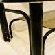 Black and gold coffee table with double tops in smoked glass circa 1970