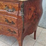 Louis XV curved chest of drawers in rosewood marquetry