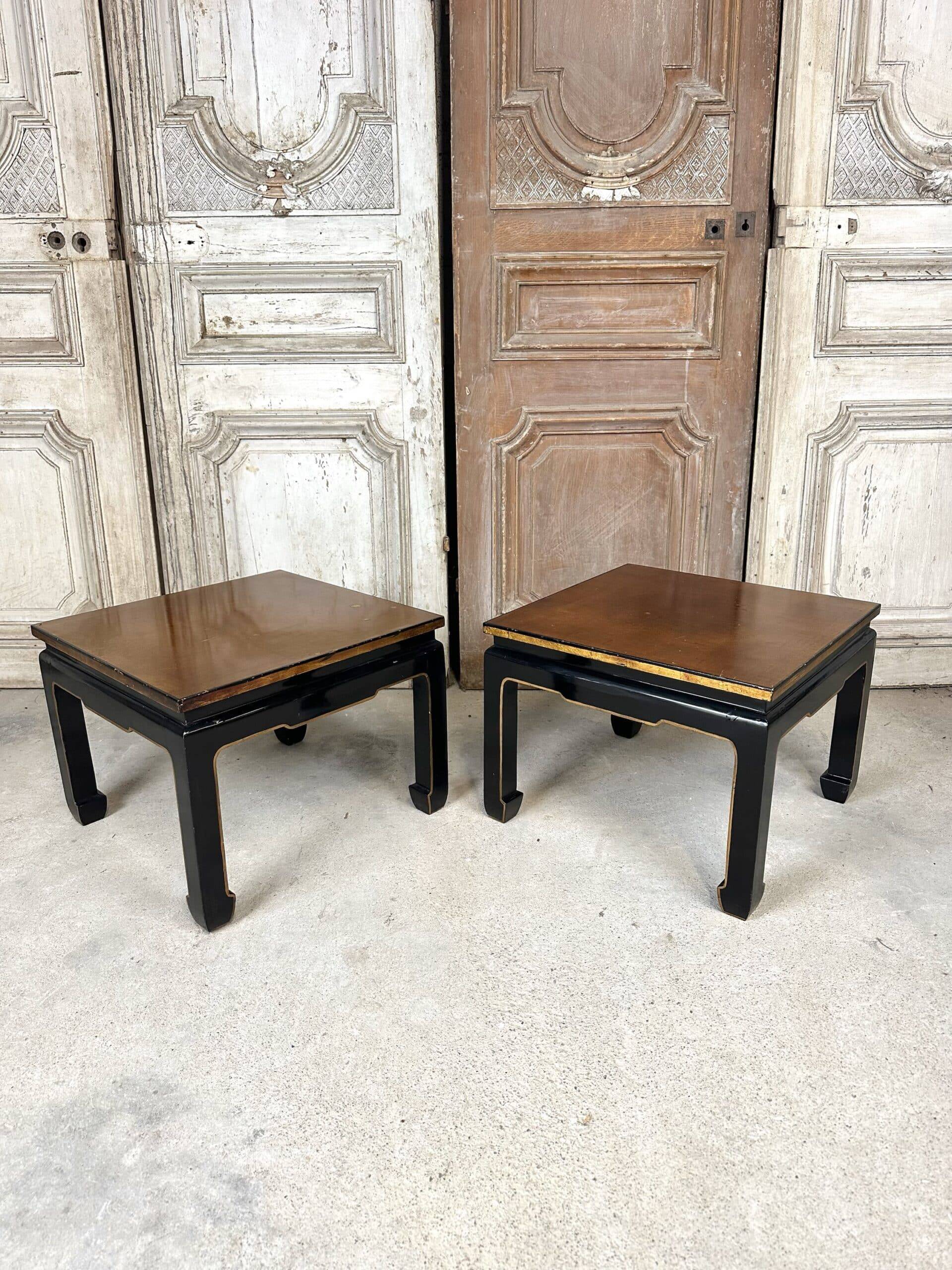 Pair of side tables in black and gold lacquer