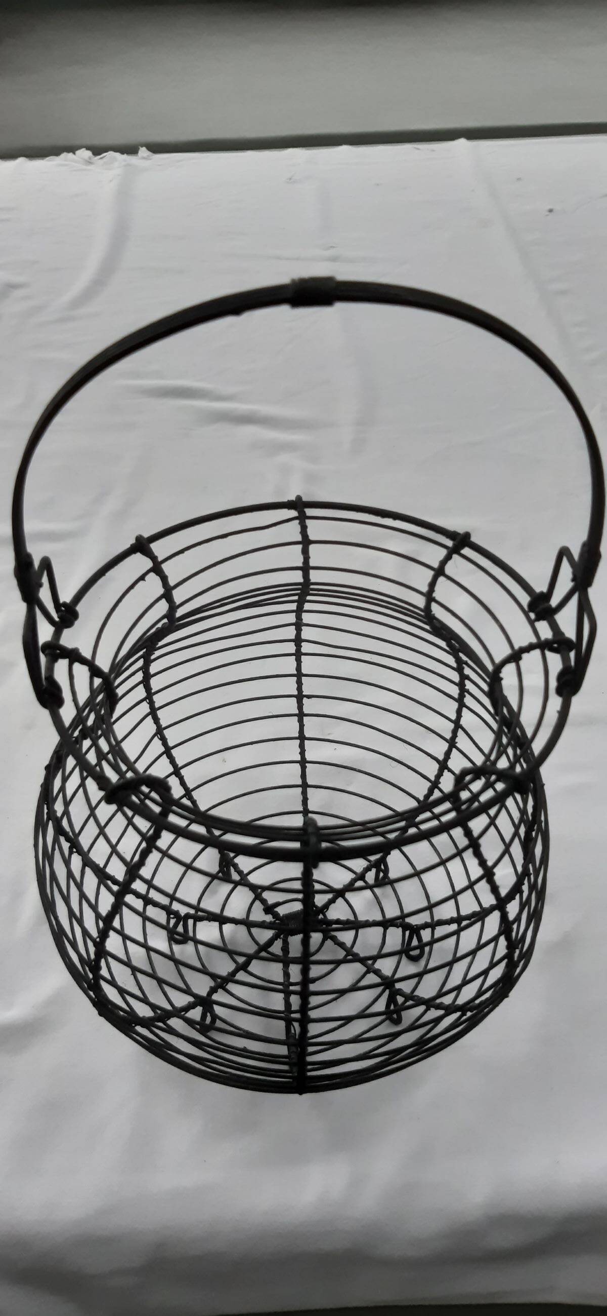 Old metal egg basket