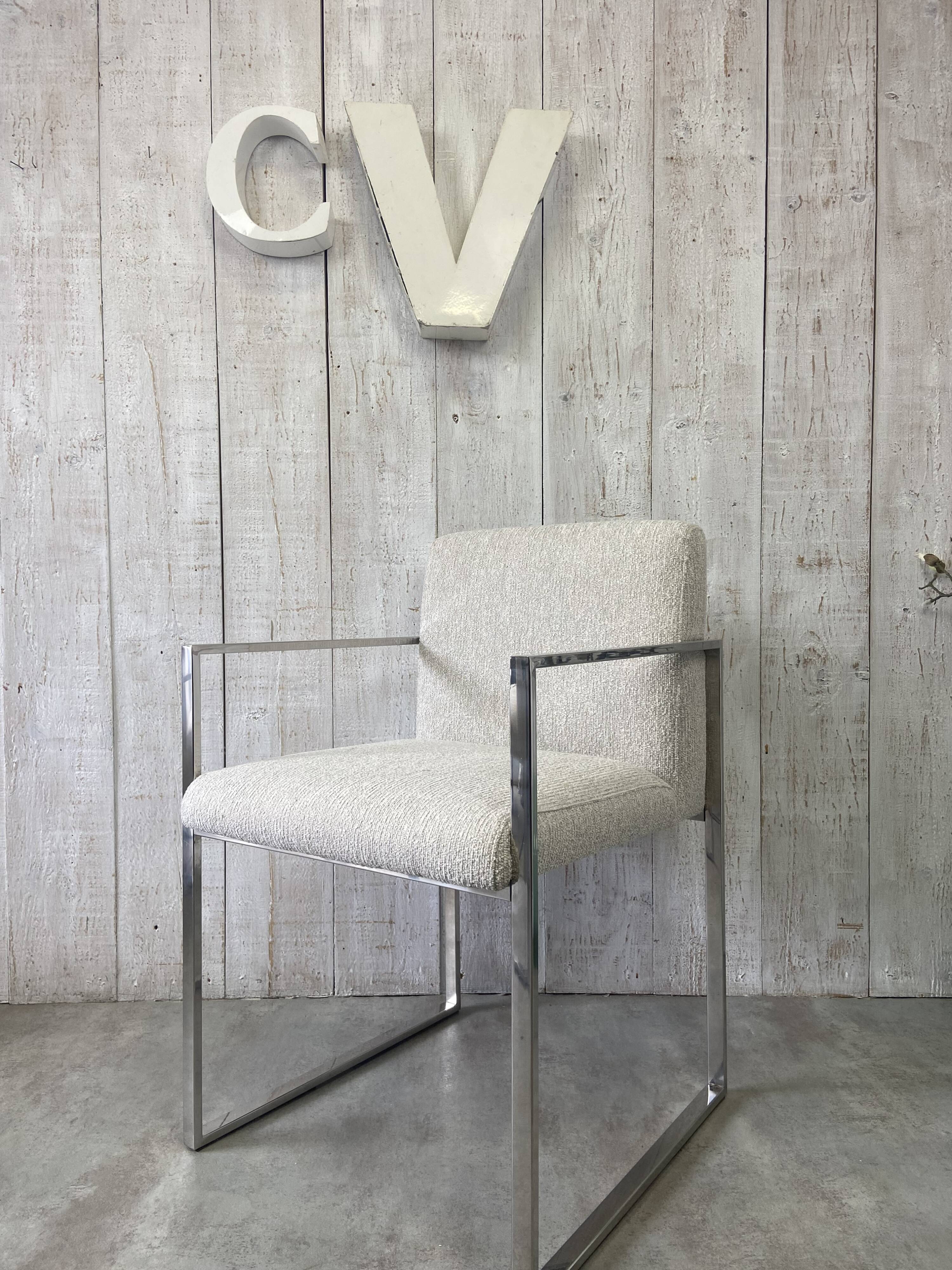 Pair of stainless steel armchairs from the 70s