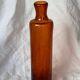 Biot blown glass bottle
