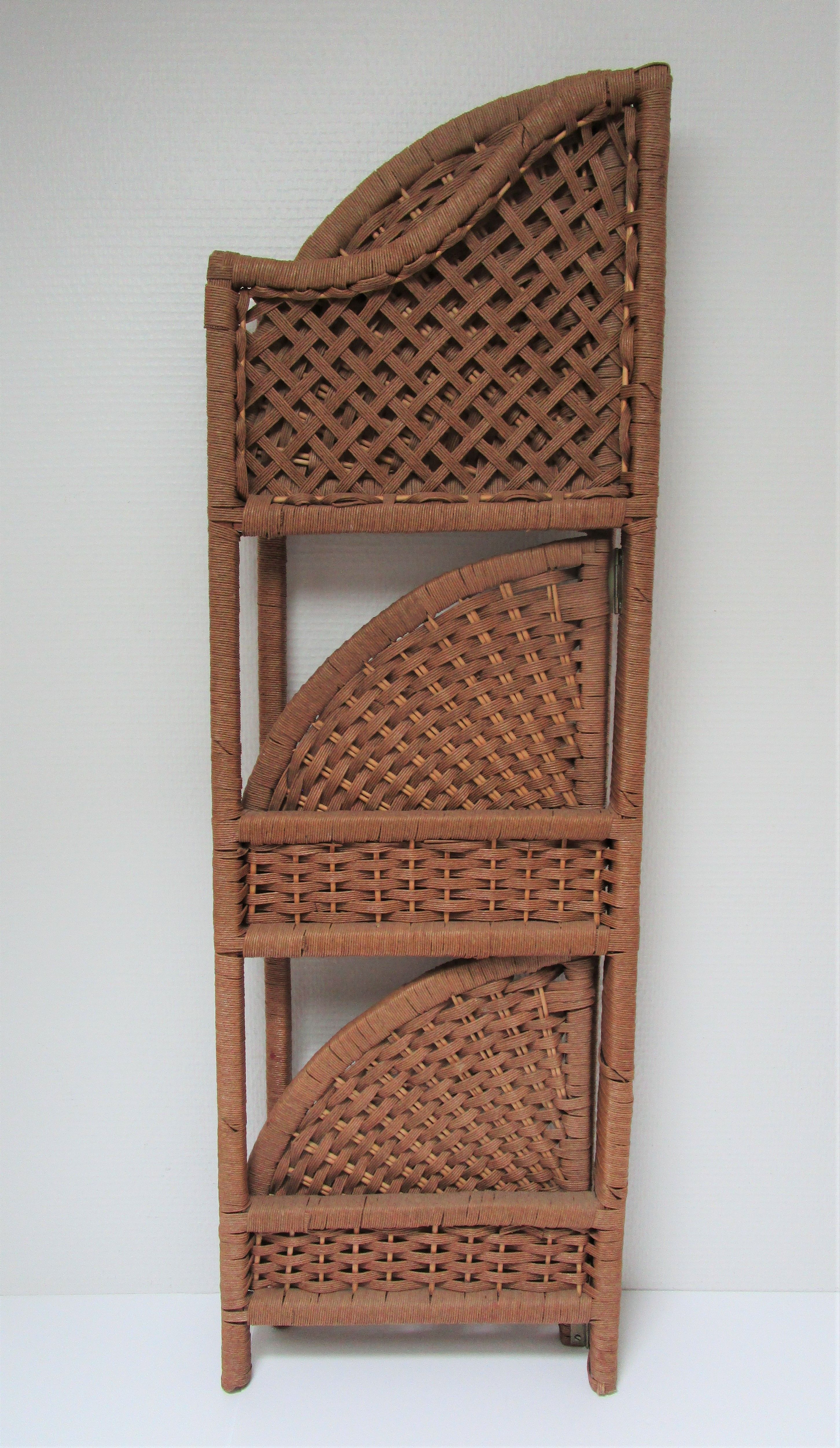 Corner shelf made of vintage braided natural fibers