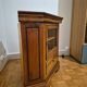 Wooden TV unit with a rotating top.