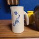 Modernist ceramic pitcher, signed polychrome decoration