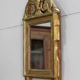 Miroir en bois doré, style Louis XVl, début XXe