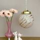 Vintage art deco globe pendant light in pink and gold Clichy glass