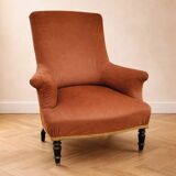 Antique brown velvet tub chair – turned legs and brass rings.
