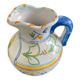 White and blue earthenware milk pitcher