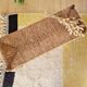 Old wooden and straw bench