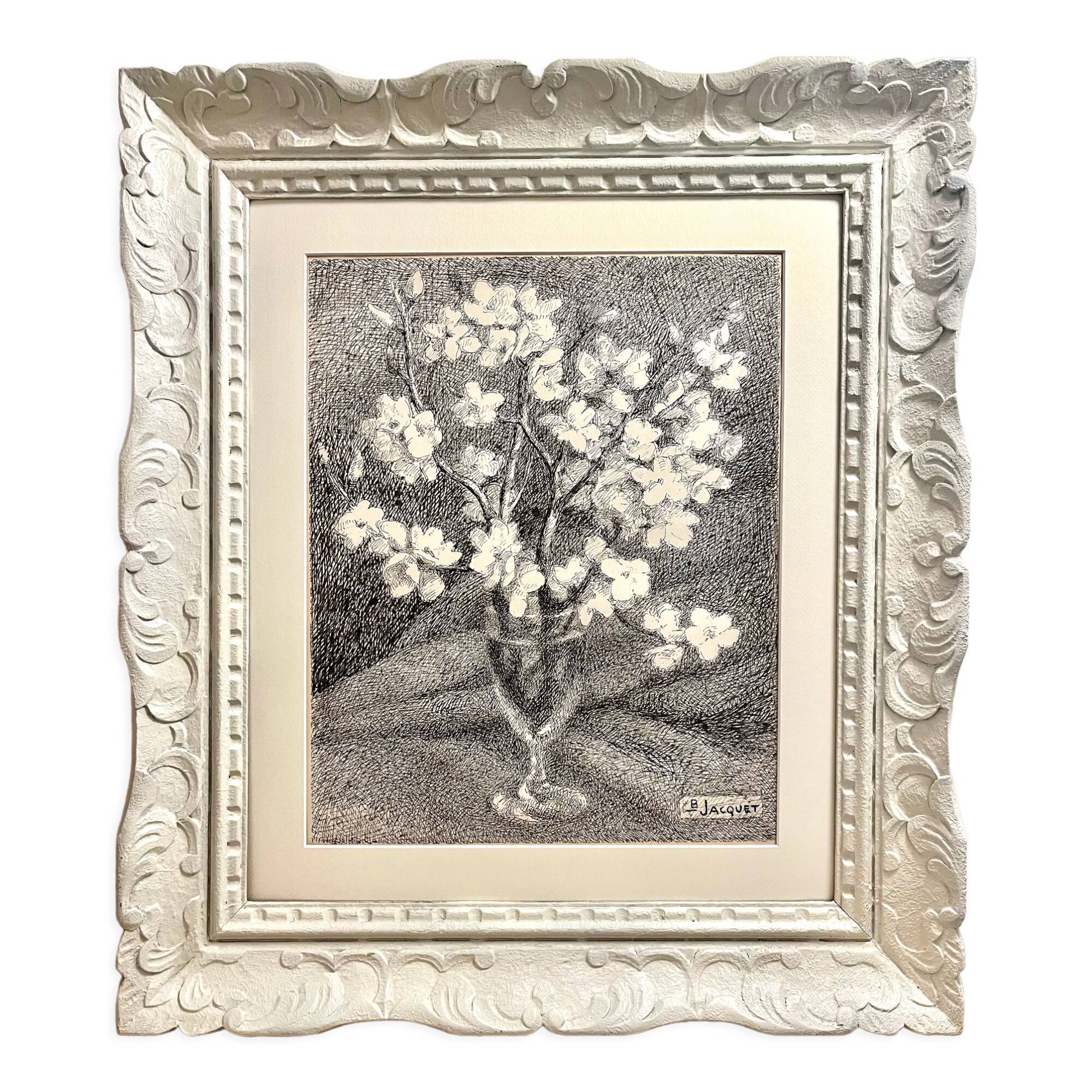 Almond branches in bloom in a glass of water