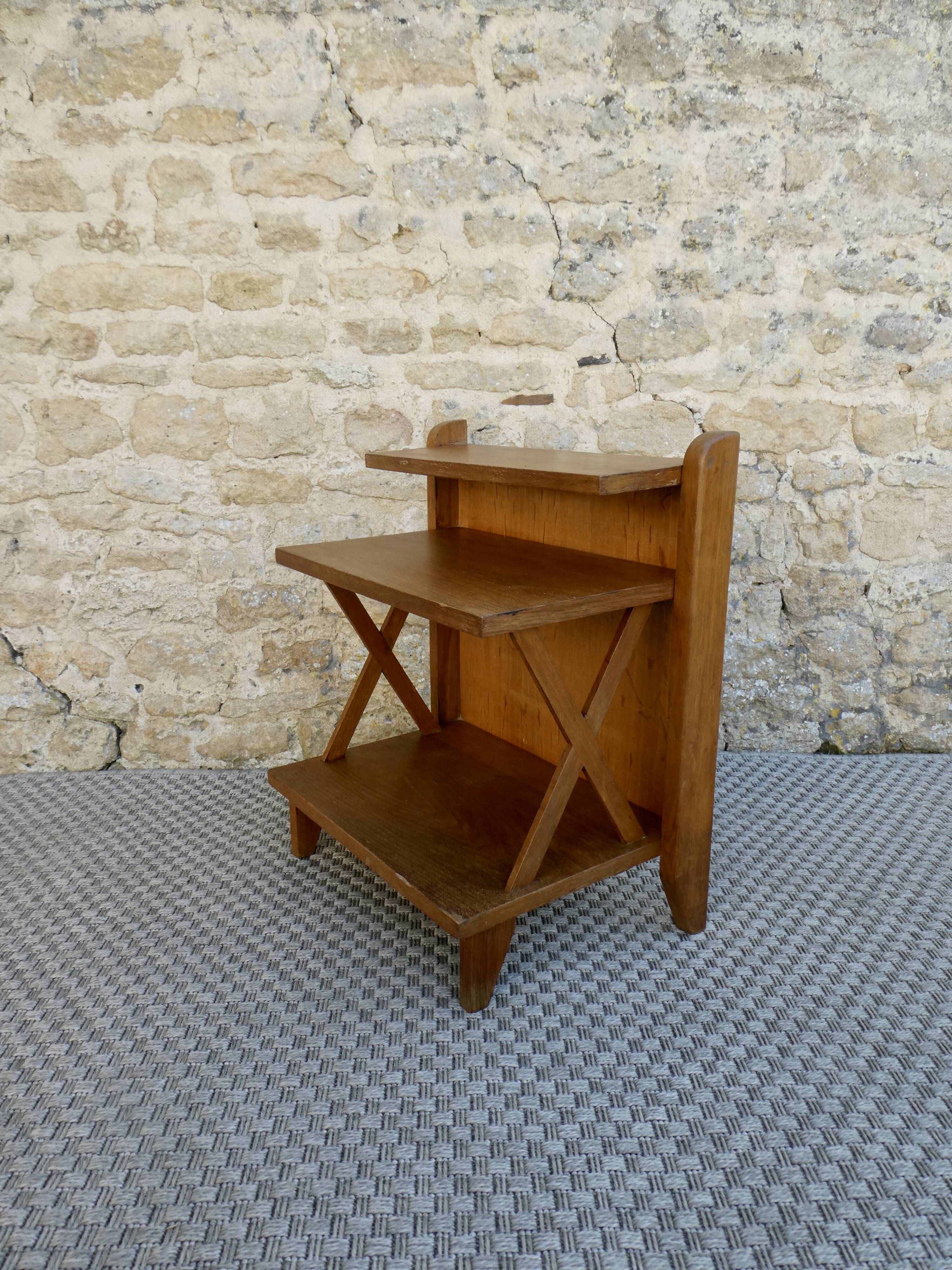 Light wood bedside table with crossbars and 3 shelves, around 1950.