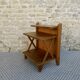 Light wood bedside table with crossbars and 3 shelves, around 1950.