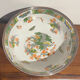 Shallow porcelain dish from Limoges Raynaud, bird decoration.