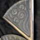 Pair of angular art deco wall sconces with silver metal frames