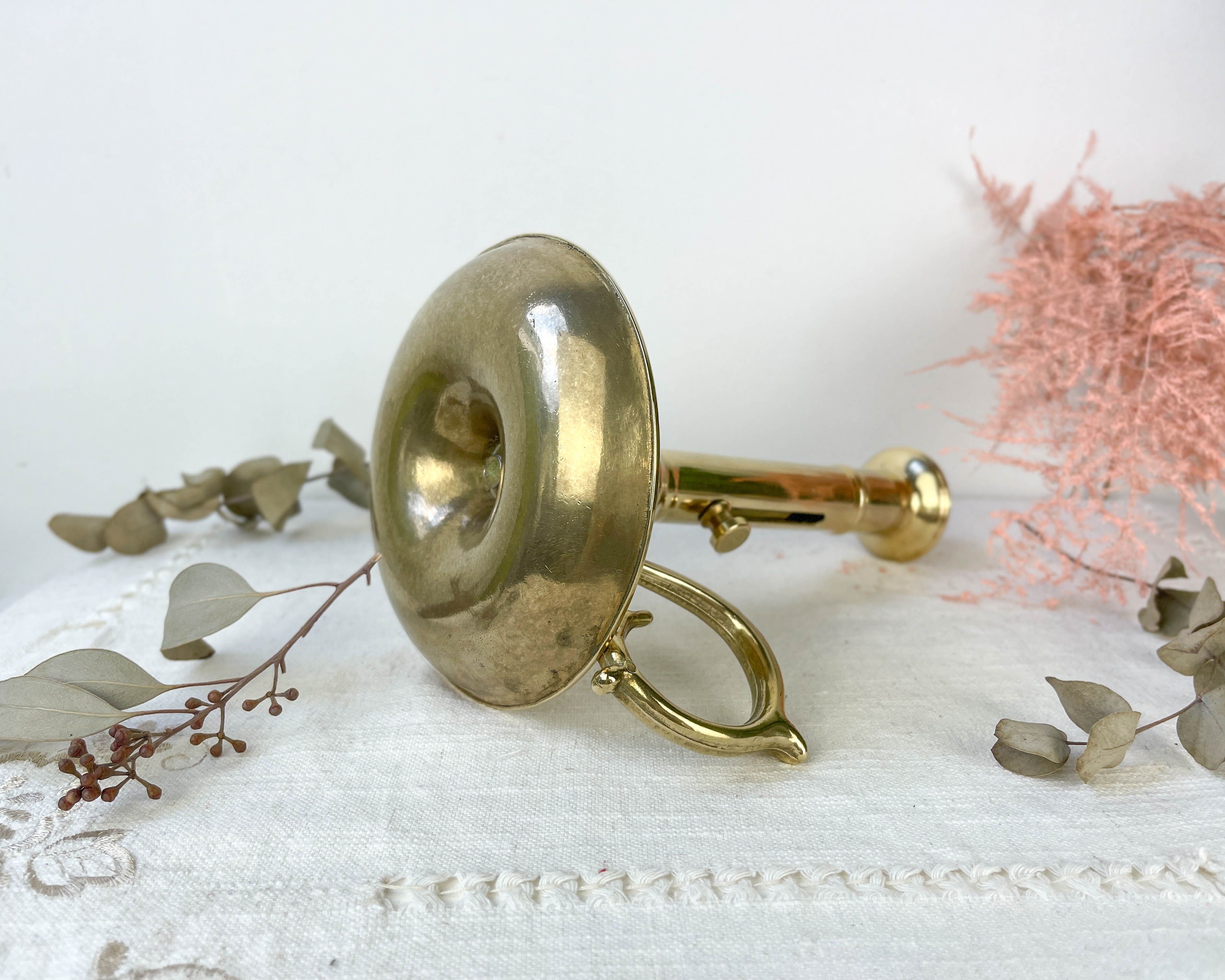 Brass candle holder with pusher late nineteenth century