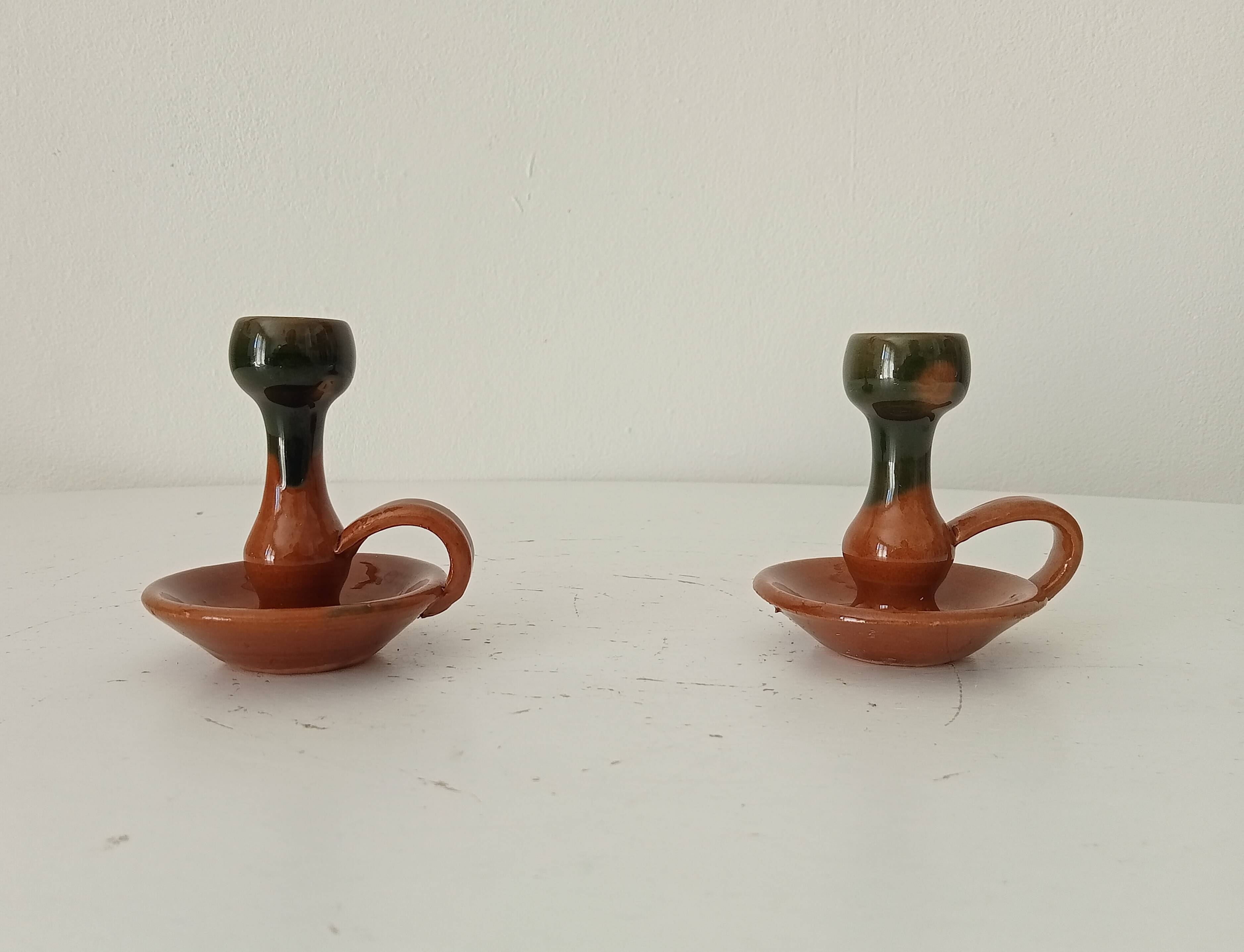 Vintage hand-held candlestick in glazed ceramic