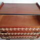 Teak and rattan chest of drawers feet compass