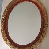 Modern oval mirror with flower decoration