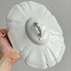 White fine porcelain soup tureen with relief decoration.