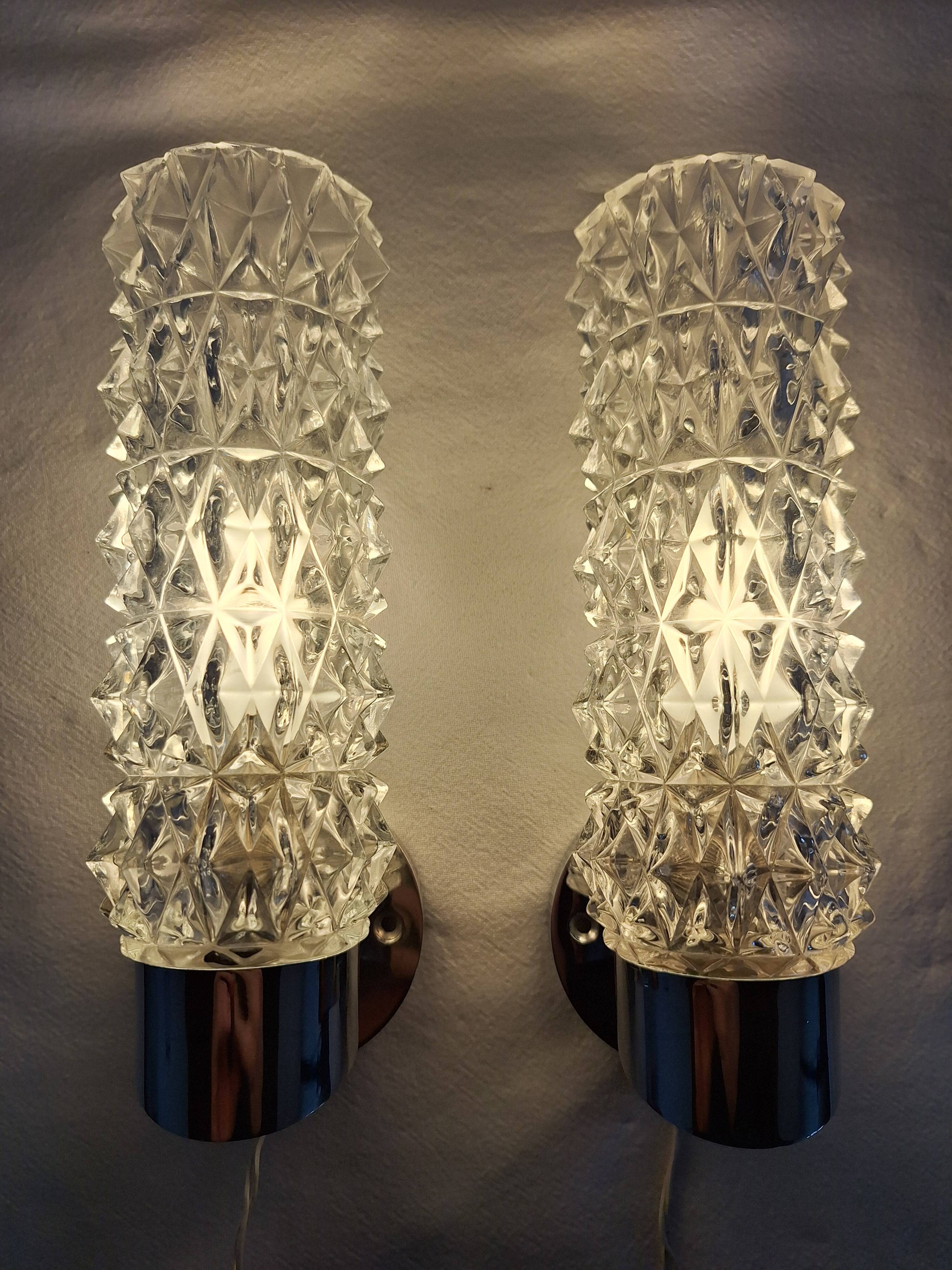 Pair of vintage space age chrome and molded glass wall lights, bedside night light