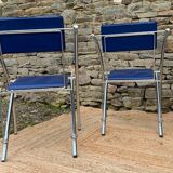 Quartet of blue chairs with design curves