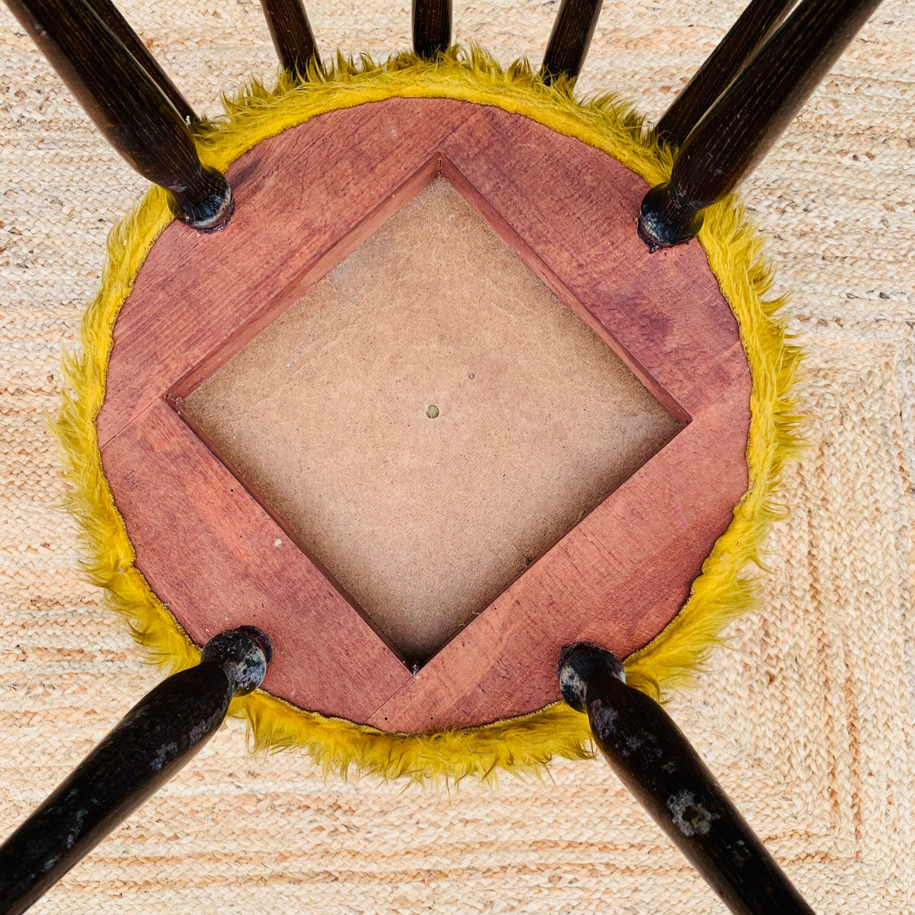 Pair of yellow moumoute chairs