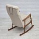 1970s, Danish rocking chair, reupholstered in quality genuine sheepskin.