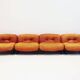 Set of four modular sun loungers by Giuseppe Munari upholstered in cognac leather.