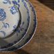 2 flat plates mismatched iron earth with blue flower motifs France