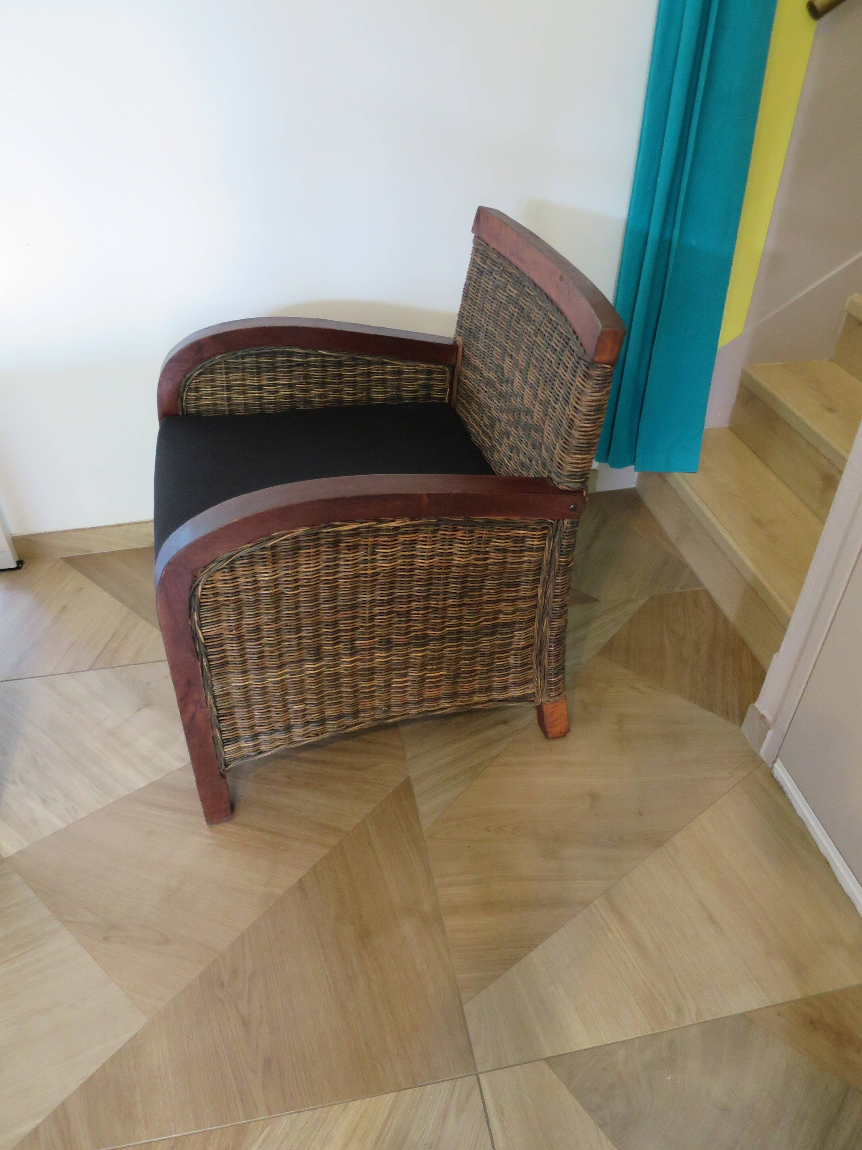 2 colonial-style armchairs in woven rattan and exotic wood