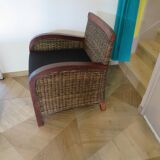 2 colonial-style armchairs in woven rattan and exotic wood