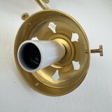 A pair of vintage opaline and brass wall lights